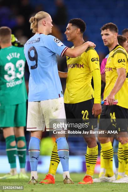 Erling Haaland of Manchester City hugs Jude Bellingham of Borussia Dortmund at full time during the UEFA Champions League group G match between...