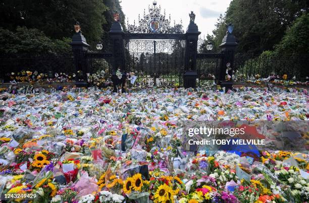 Floral tributes are pictured outside Norwich Gate on the Sandringham Estate in Sandringham, eastern England, on September 15 following the death of...