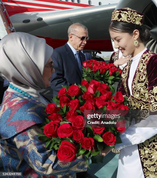 Turkish President Recep Tayyip Erdogan and his wife Emine Erdogan are welcomed as they arrive Uzbekistan's Samarkand to attend the 22nd Meeting of...