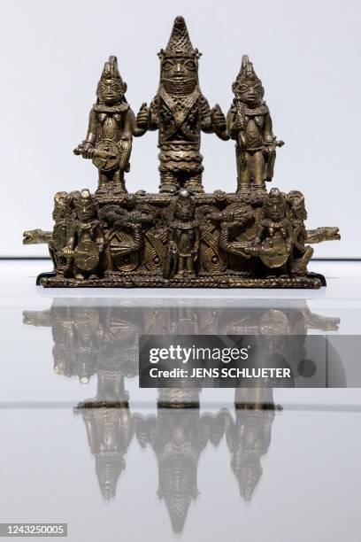 An 'Altar group with a queen mother' is displayed as part of an exhibition on the 'Benin Bronzes' during a press preview of new exhibition halls...