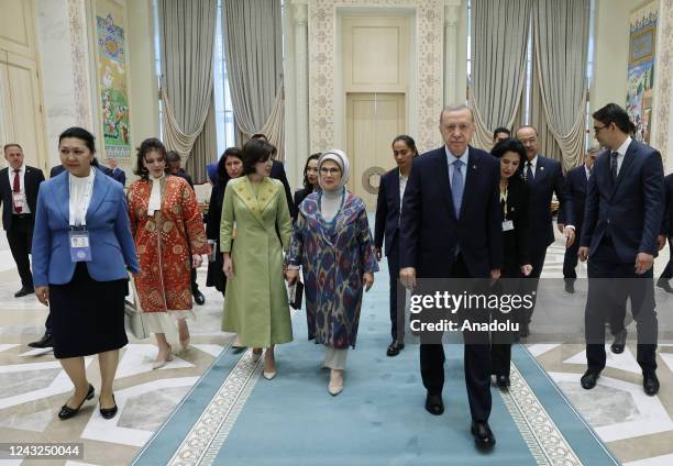 Turkish President Recep Tayyip Erdogan and his wife Emine Erdogan are welcomed as they arrive Uzbekistan's Samarkand to attend the 22nd Meeting of...