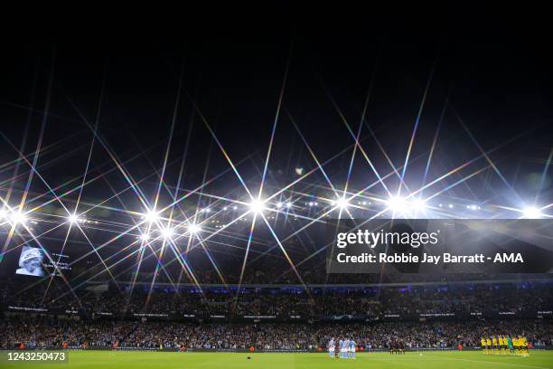 General view as fans and players of both teams pay their respects to the late Her Majesty Queen Elizabeth II during the UEFA Champions League group G...