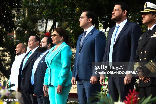 Tegucigalpa's Mayor Jorge Aldana , Congress President Luis Redondo , Honduras' President Xiomara Castro , her son and Secretary of the Presidency...