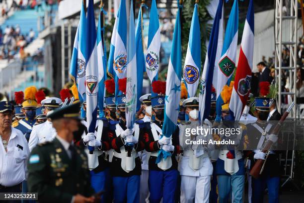 Flag-bearing cadets parade during the 201 years of independence of Honduras in Tegucigalpa, Honduras on September 15, 2022.