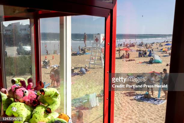 The busy beach seen from the arcade room on the pier in Old Orchard Beach on Monday, July 11, 2022.