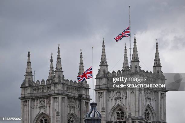 The Union Jack flag flies half mast at Westminster Abbey in London on September 15 following the death of Britain's Queen Elizabeth II on September...