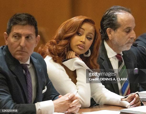 Rapper and songwriter Cardi B appears at Queens County Criminal Court in New York on September 15, 2022. - Cardi B is appearing in court for a...