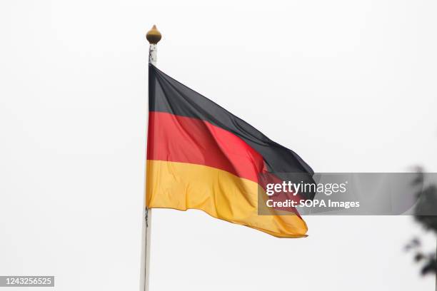 The flag of Germany seen in the gallery of flags of the participating countries in the framework of St. Petersburg International Gas Forum 2022 .