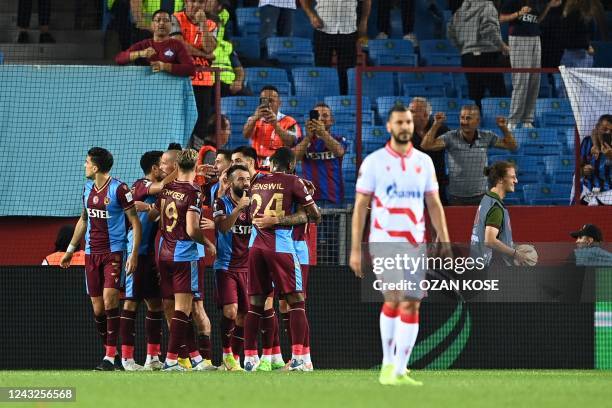 Trabzonspor's players celebrate after scoring a goal during the UEFA Europa League group H football match between Trabzonspor and FK Crvena zvezda at...