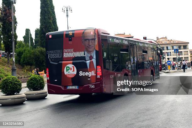 The electoral poster of Enrico Letta, leader of the Democratic Party, is displayed on a bus ahead of the general elections of 25 September 2022.