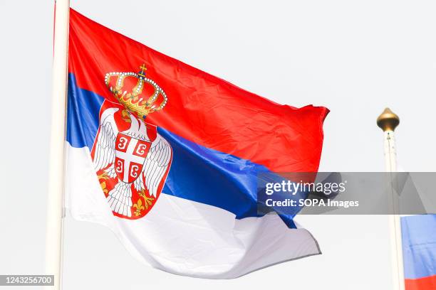 The flag of Serbia seen in the gallery of flags of the participating countries in the framework of St. Petersburg International Gas Forum 2022 .