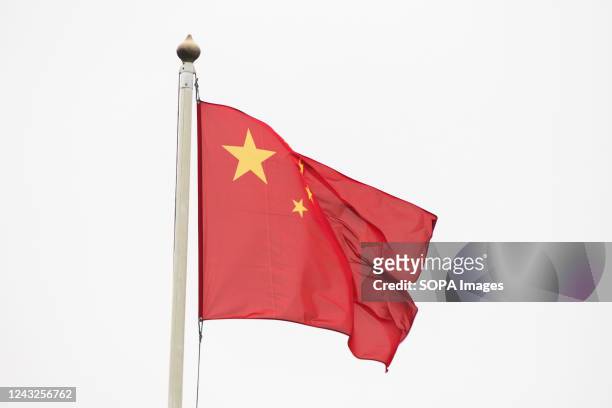 The flag of China seen in the gallery of flags of the participating countries in the framework of St. Petersburg International Gas Forum 2022 .