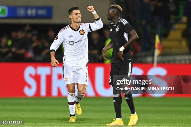 Manchester United's Portuguese striker Cristiano Ronaldo celebrates scoring the 0-2 from the penalty spot during the UEFA Europa League group E...