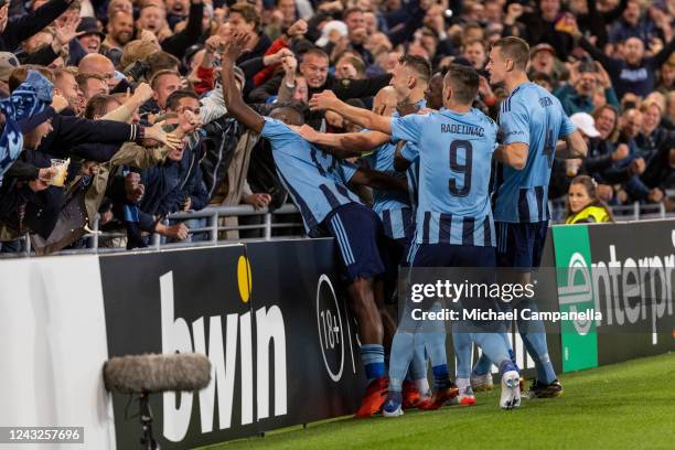 Emmanuel Banda of Djurgardens IF celebrates scoring the 2-1 with teammate goal during the UEFA Europa Conference League group F match between...