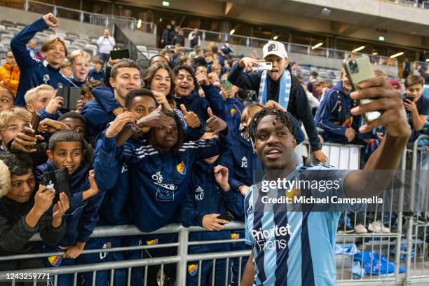 Joel Asoro of Djurgarden celebrates taking selfies with supporters during the UEFA Europa Conference League group F match between Djurgardens IF and...