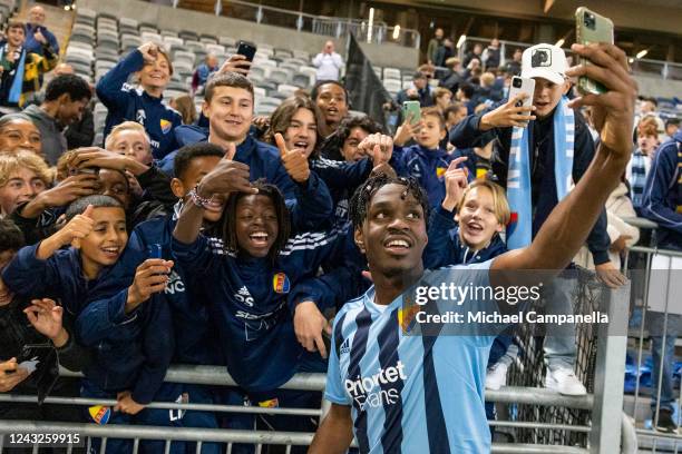 Joel Asoro of Djurgarden celebrates taking selfies with supporters during the UEFA Europa Conference League group F match between Djurgardens IF and...
