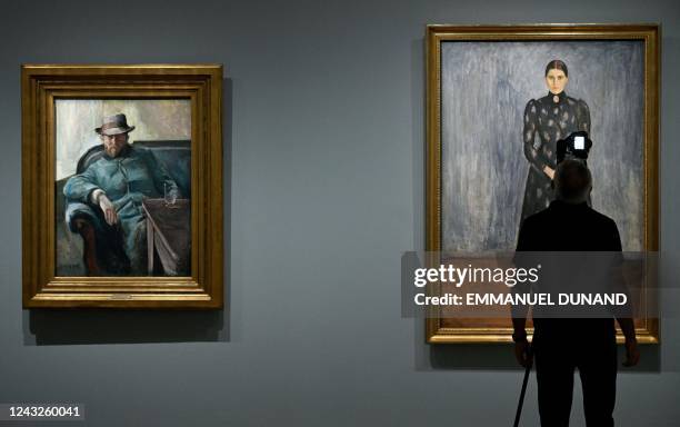 Museum photographer takes a picture of "Portrait of Inger Munch" painting by Norwegian painter Edvard Munch during the preview of the "Edvard Munch....