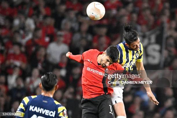 Rennes' French forward Martin Terrier heads the ball with Fenerbahce's Brazilian defender Gustavo Henrique during the UEFA Europa League Group B...