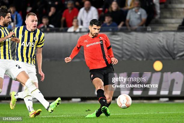 Rennes' French forward Martin Terrier shoots to score the first goal for his tean during the UEFA Europa League Group B group stage football match...