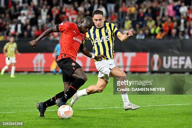 Rennes' Malian defender Hamari Traore fights for the ball with Fenerbahce's Uruguayan forward Diego Rossi during the UEFA Europa League Group B group...