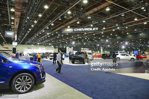 Visitors at the Detroit Auto Show browse the show room floor, in Downtown Detroit, Michigan on September 14, 2022.