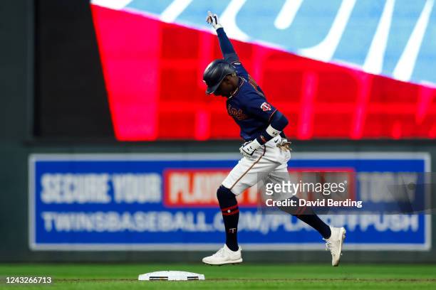 Nick Gordon of the Minnesota Twins celebrates his two-run home run as he rounds the bases against the Kansas City Royals in the second inning of the...