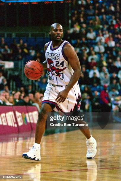 Shawn Respert of the Toronto Raptors drives against the Chicago Bulls on February 19, 1998 at Air Canada Centre in Toronto, Ontario. NOTE TO USER:...