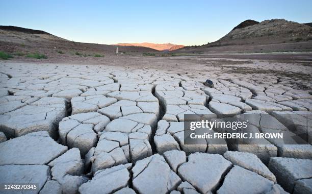 Dry cracked lake bed in drought-stricken Lake Mead on September 15, 2022 in Boulder City, Nevada. - Located outside of Las Vegas near the...