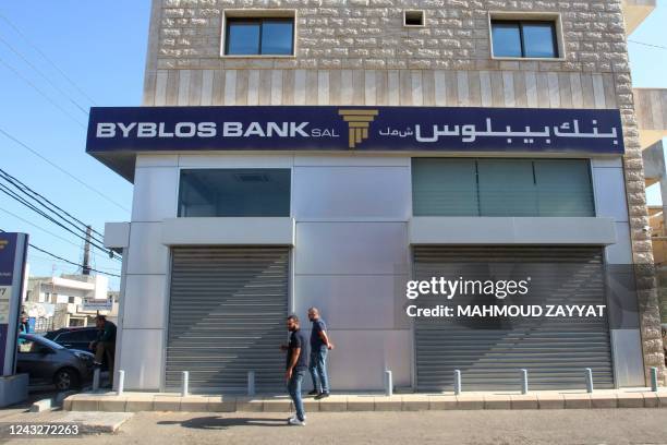 Picture taken on September 16 shows the branch of the Byblos bank in the town of Ghaziyeh, south of the Lebanese port city of Saida , after it was...