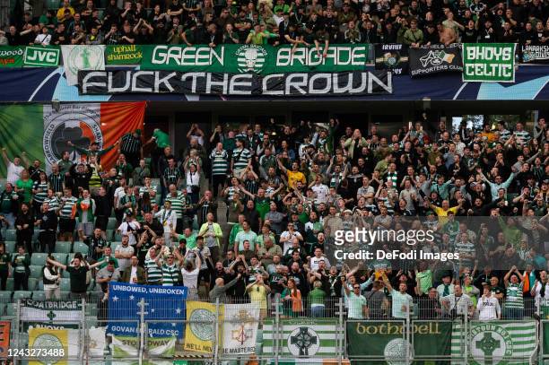 Supporters of Celtic Glasgow are seen at the stand with banner Fuck The Crown prior to the UEFA Champions League group F match between Shakhtar...