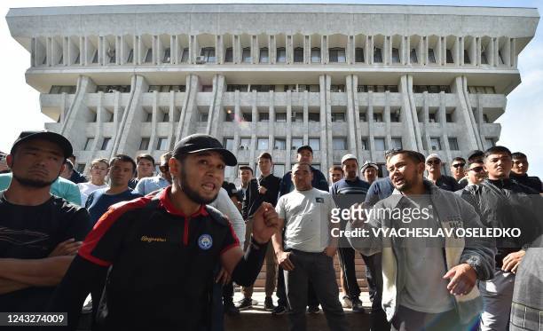 Protesters hold a rally to demand of the authorities to support residents of Kyrgyzstan's southern Batken province following border clashes with...