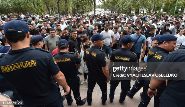 Protesters hold a rally to demand of the authorities to support residents of Kyrgyzstan's southern Batken province following border clashes with...