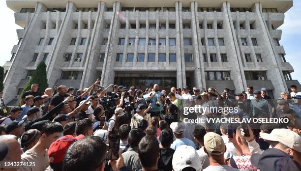 Protesters hold a rally to demand of the authorities to support residents of Kyrgyzstan's southern Batken province following border clashes with...