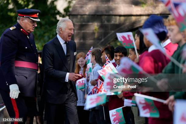 Britain's King Charles III meets the local community after a Service of Prayer and Reflection for the life of Queen Elizabeth II, at Llandaff...