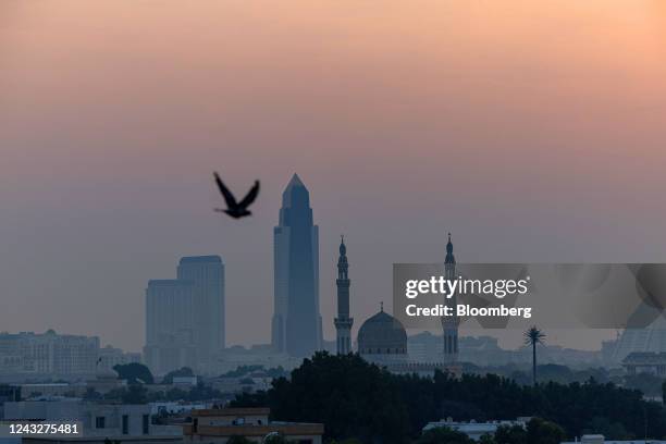 The minarets of a mosque among commercial and residential properties on the city skyline in the Zaabeel and Healthcare City districts of Dubai,...