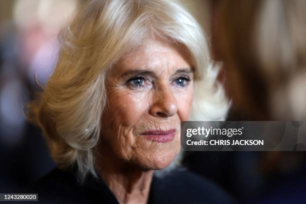 Britain's Camilla, Queen Consort reacts during a visit at Cardiff Castle, in Cardiff, in south Wales on September 16, 2022. King Charles III heads to...