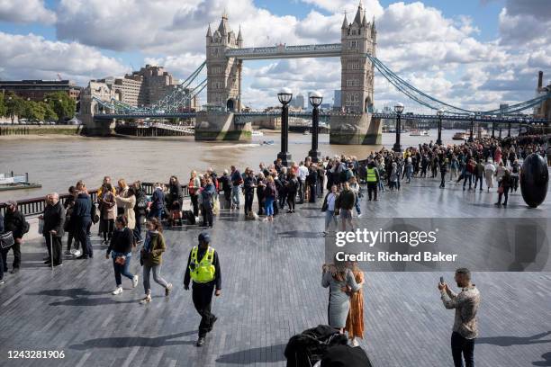 Following the death, at the age of 96, of Queen Elizabeth II, members of the public queue past Tower Bridge in Southwark to view the former monarch's...