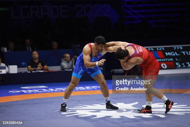 Taha Akgul of Turkiye in action against his Mongolian opponent Lkhagvagerel Munkhtur in final of World Wrestling Championship, in Belgrade, Serbia on...