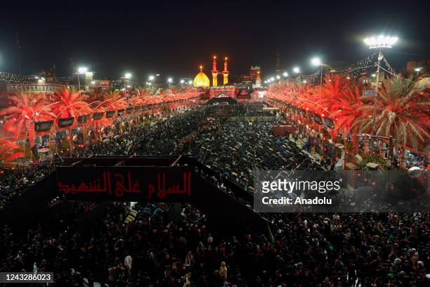 People attend Arbain events in Karbala, Iraq, 16 September 2022. Thousands of visitors participating in the events, perform the evening prayer in the...