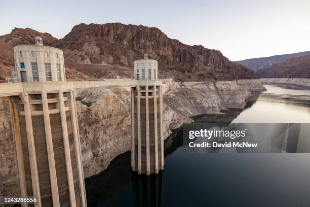 Lake Meads white bathtub ring reveals historic water level decline near Hoover Dam on September 16, 2022 in Boulder City, Nevada. The federal...