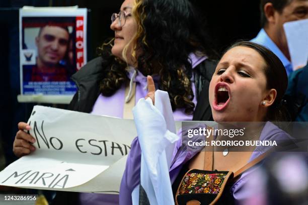 Women's rights activists hold a protest sit-in in front of the Attorney General's Office in Quito on September 16 against the disappearance of a...