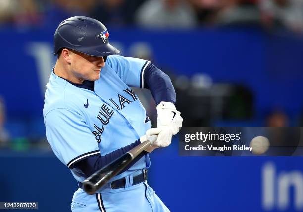 Matt Chapman of the Toronto Blue Jays hits a solo home run in the second inning against the Baltimore Orioles at Rogers Centre on September 16, 2022...