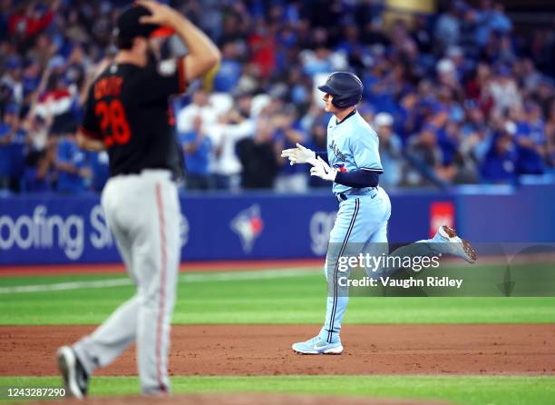 Matt Chapman of the Toronto Blue Jays runs the bases after hitting a solo home run in the second inning against the Baltimore Orioles at Rogers...