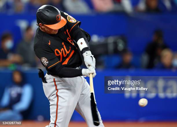 Adley Rutschman of the Baltimore Orioles hits a 2-run home run in the fourth inning against the Toronto Blue Jays at Rogers Centre on September 16,...
