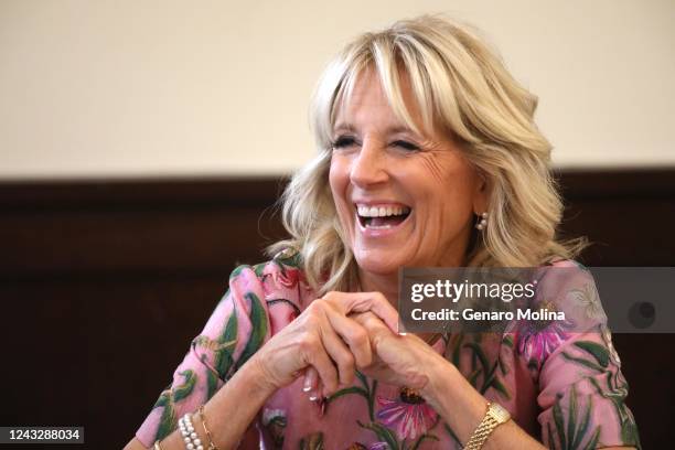 First Lady Jill Biden enjoys a light moment while visiting Homegirl Café to mark what Biden's office says is Homeboy Industries, on-the-job training...