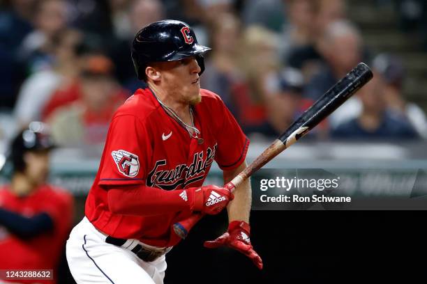 Myles Straw of the Cleveland Guardians hits an RBI single off Griffin Jax of the Minnesota Twins during the seventh inning at Progressive Field on...