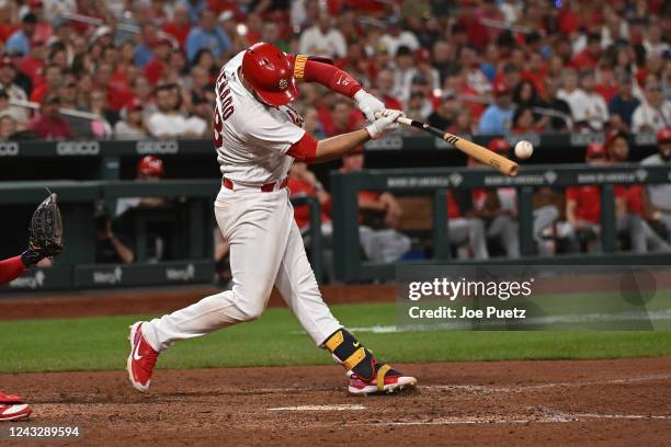 Nolan Arenado of the St. Louis Cardinals hits an RBI double against the Cincinnati Reds in the seventh inning at Busch Stadium on September 16, 2022...