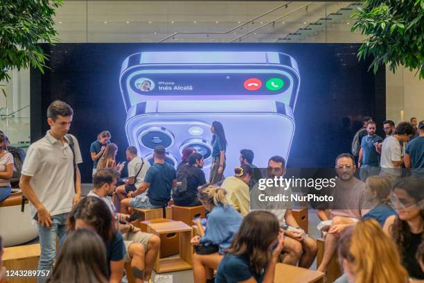 Salespeople and Customers at an Apple Store Looking at the Latest Apple  Products for Sale Editorial Stock Photo - Image of american, international:  203627338