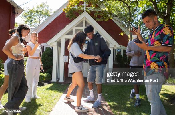 Edgartown MA - September 15th 2022: Ricardo Gallardo an undocumented immigrant from Venezuela is warmly welcomed by a Marthas Vineyard resident,...