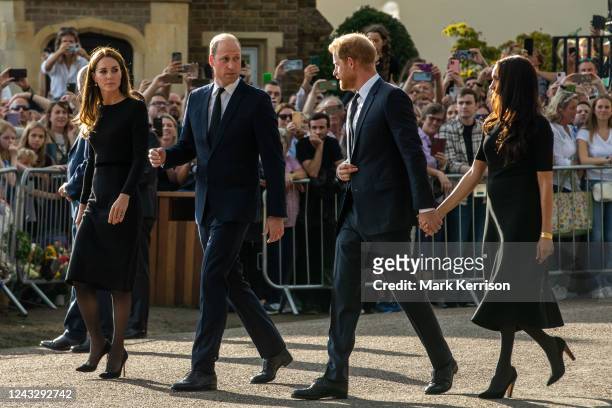 Prince William and Catherine, the new Prince and Princess of Wales, accompanied by Prince Harry and Meghan, the Duke and Duchess of Sussex, proceed...